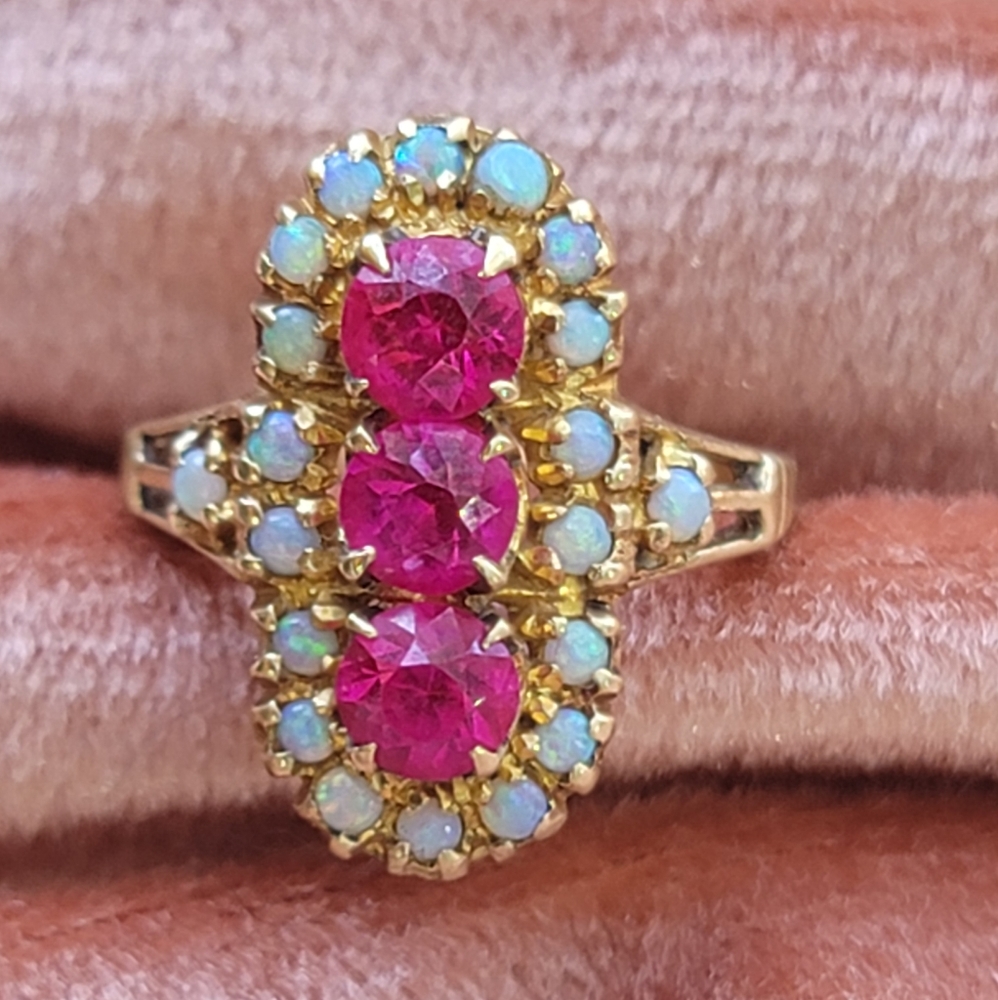 Genuine Opal and pink Sapphire ring
